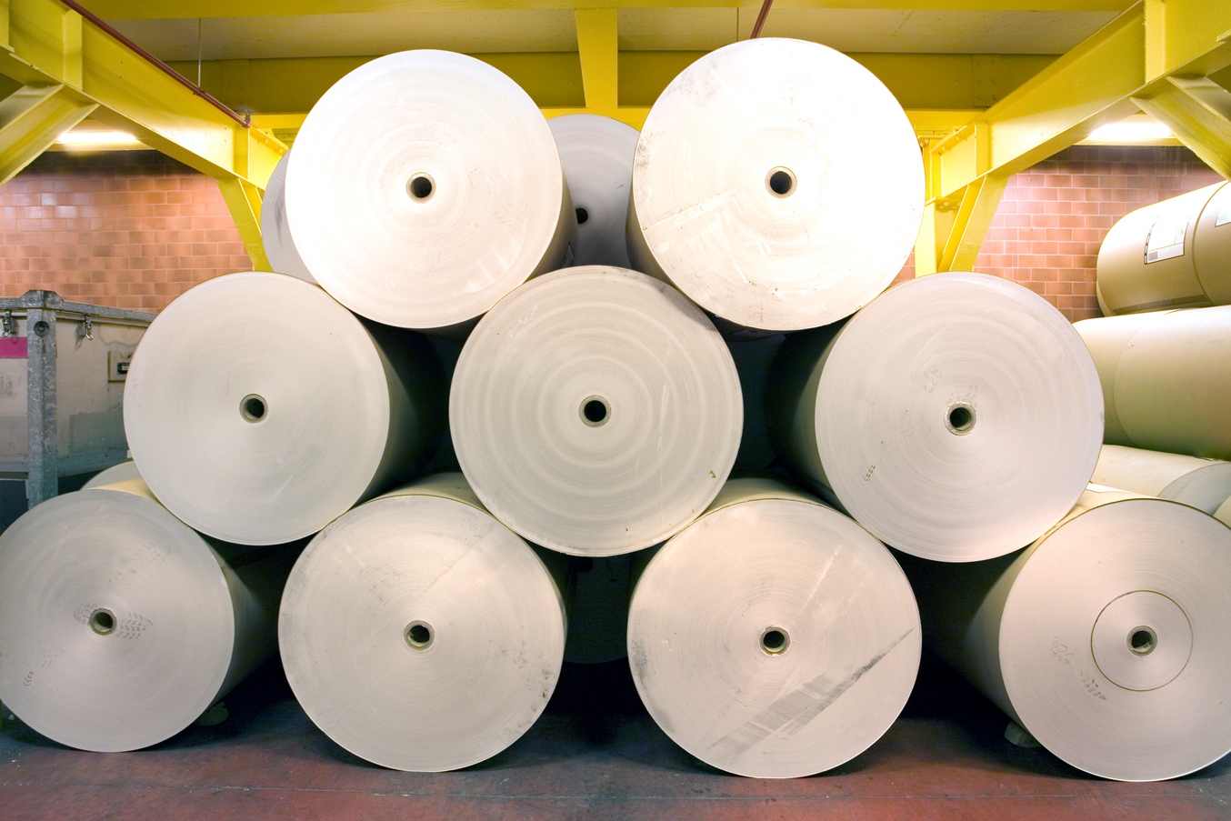 Spools of paper in a consumer goods factory.